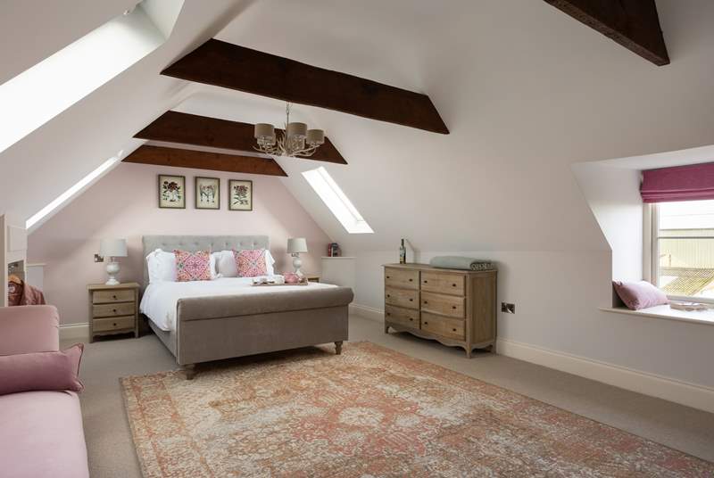 You will be enveloped in luxury in this fabulous bedroom.