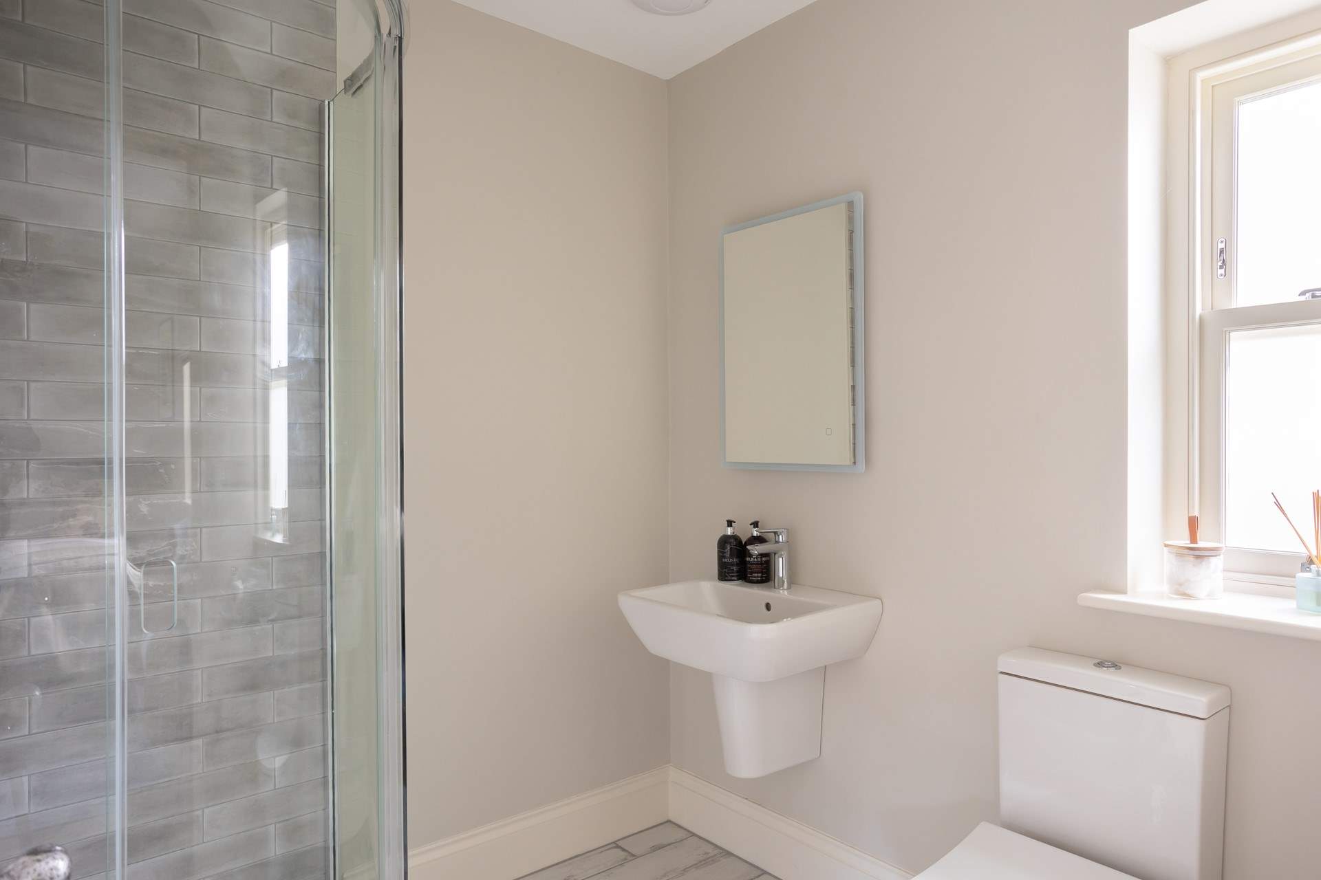 En suite shower-room on the ground floor.