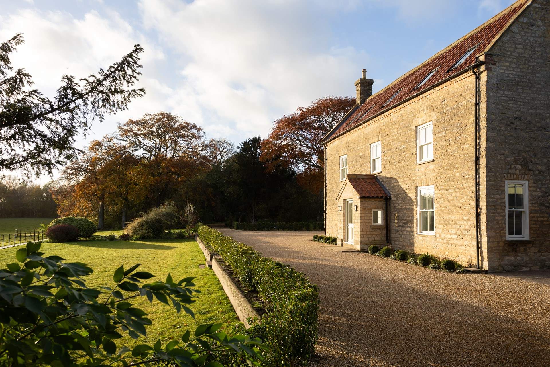 There are two acres of grounds to enjoy with a full sized tennis court at Cliff Farmhouse. 