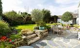 Beautiful garden with plenty of flora, the annexe is located to the right-hand side. - Thumbnail Image