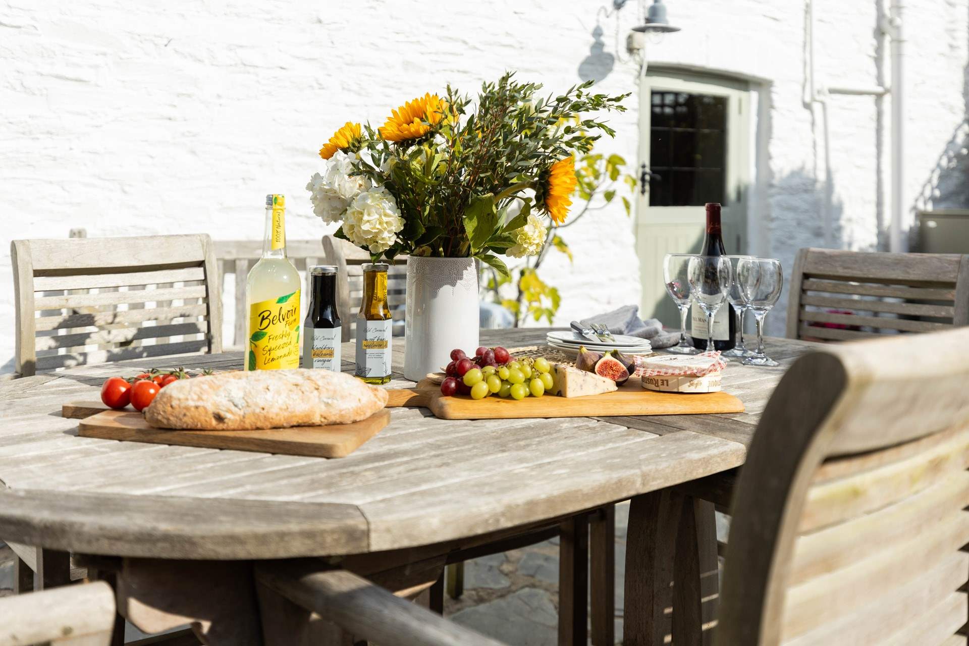 The perfect sun-trap garden for al fresco dining. 