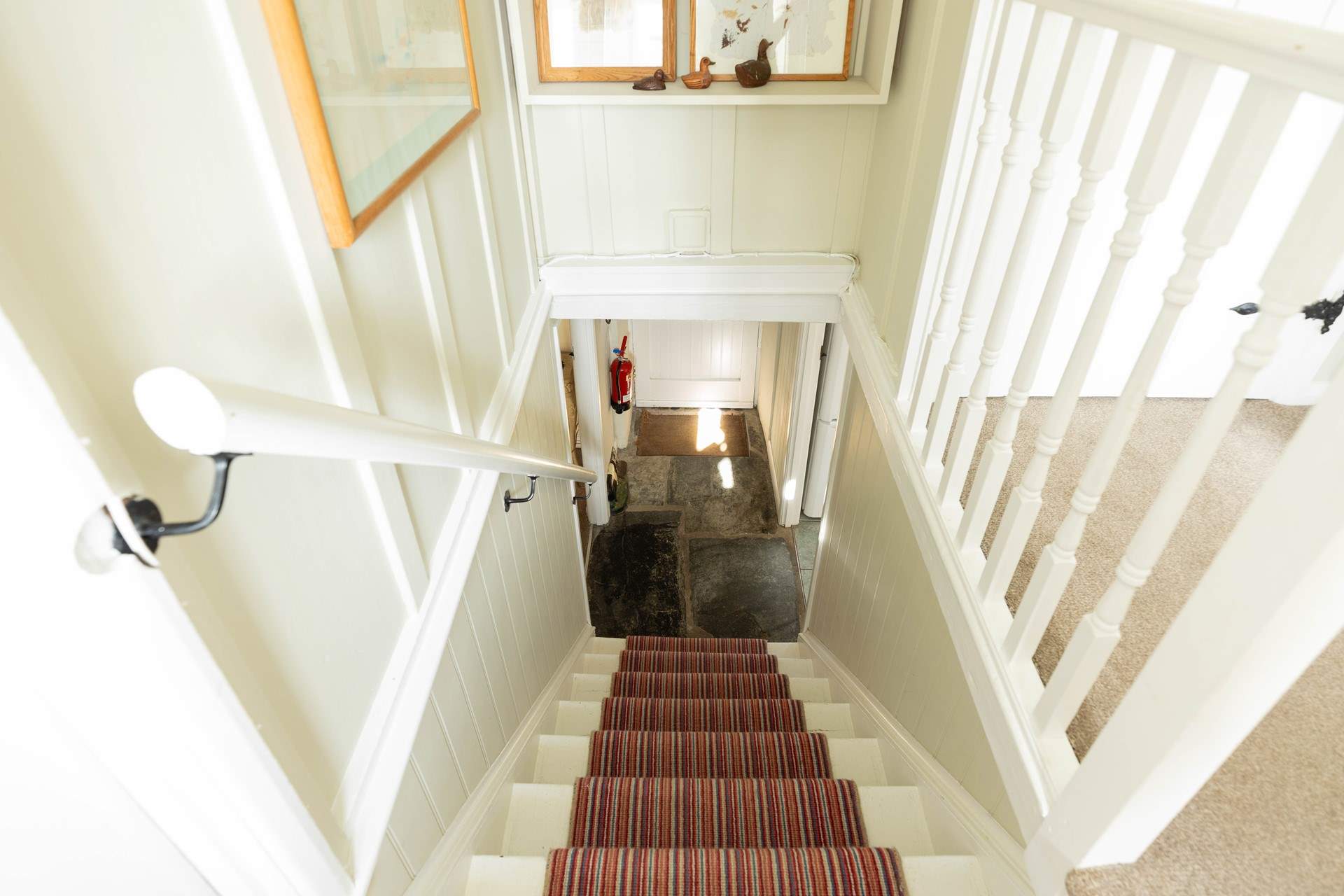 Be sure to hold the handrail down the cottage stairs. 