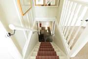 Be sure to hold the handrail down the cottage stairs.