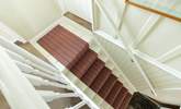 The split-level landing at the top of the stairs is typical for this age of property. - Thumbnail Image