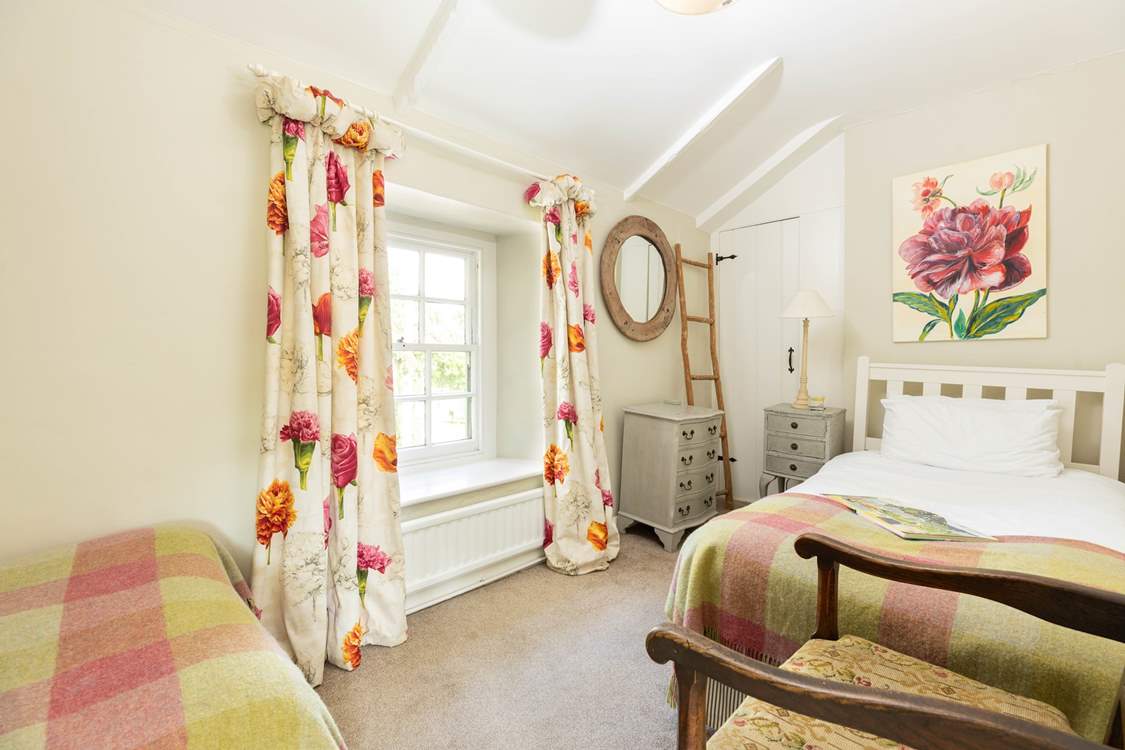 Bedroom 2 has twin beds.