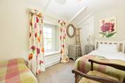 Bedroom 2 has twin beds.