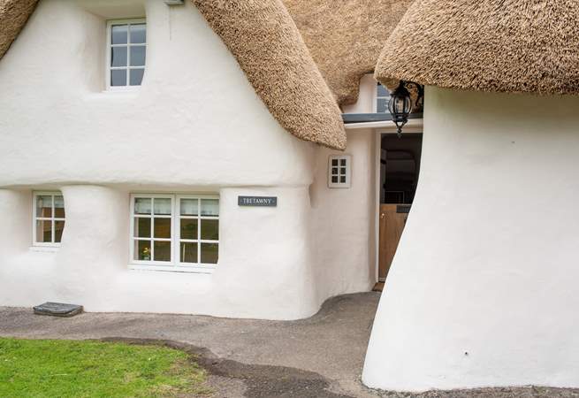 With its thatched roof and curved wall Tretawny is unique and very special.