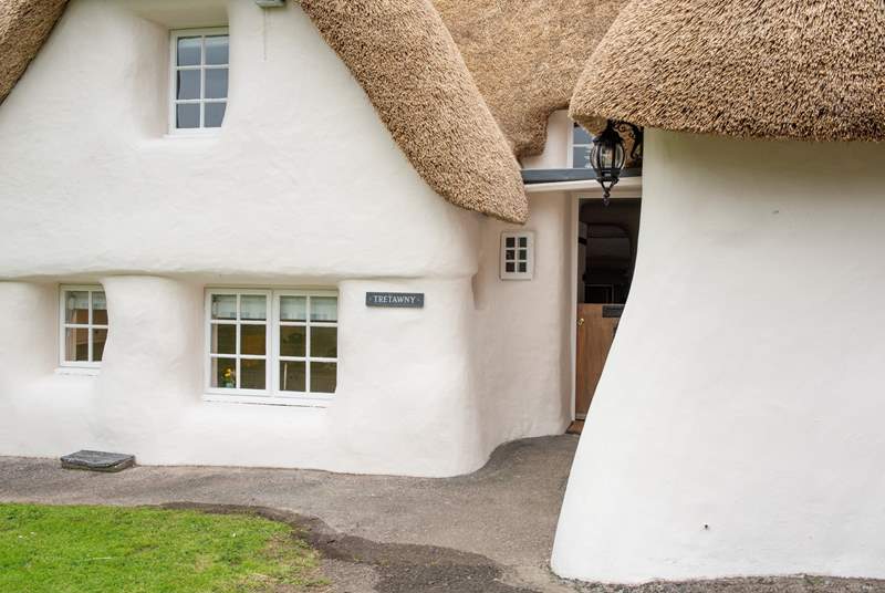 With its thatched roof and curved wall Tretawny is unique and very special.
