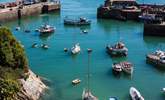 Boats bob on the water in Newquay harbour. - Thumbnail Image