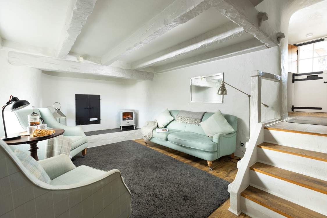 The gorgeous sitting-room with lovely homely touches.