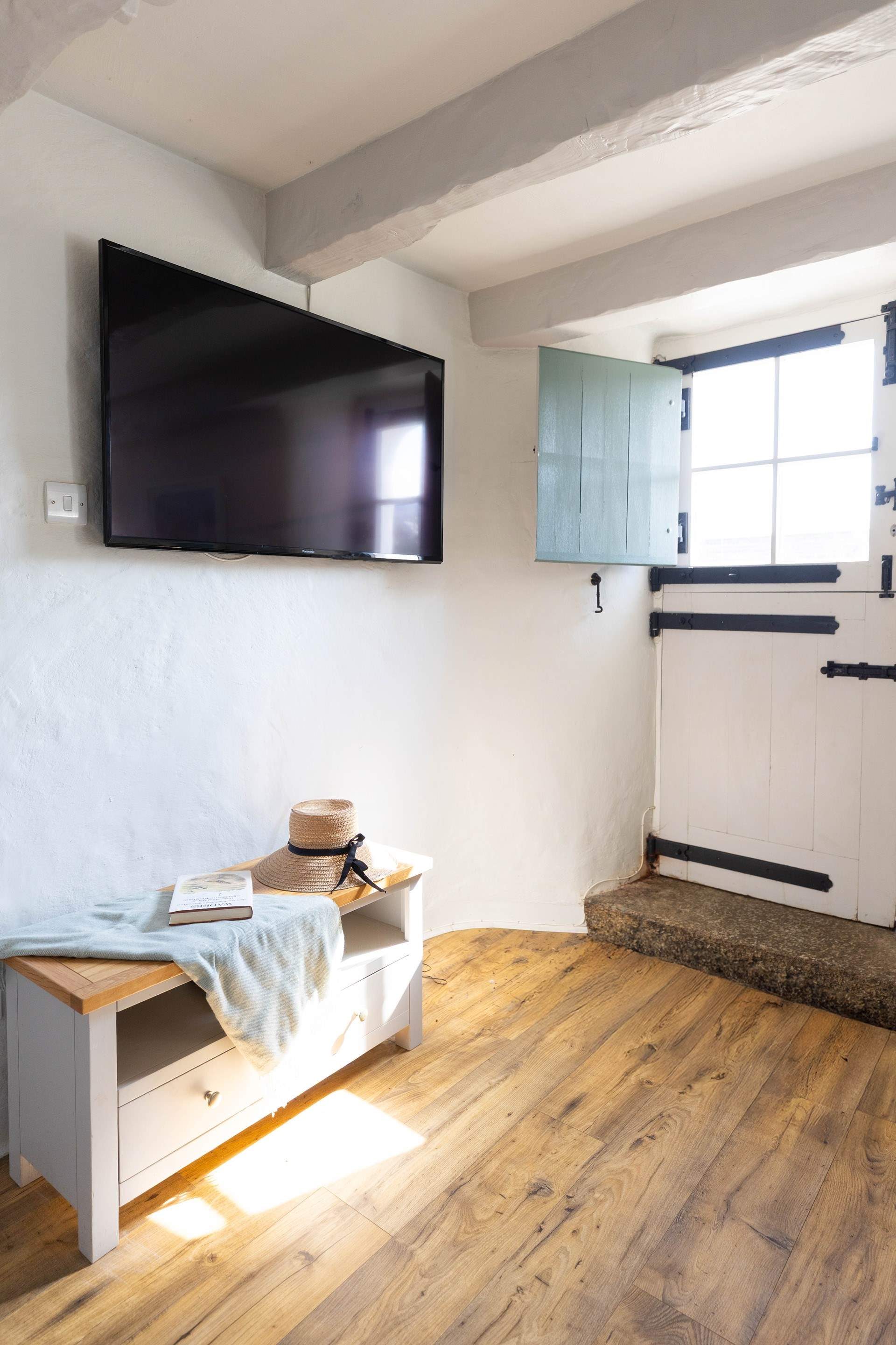 The back door opens to the garden. 