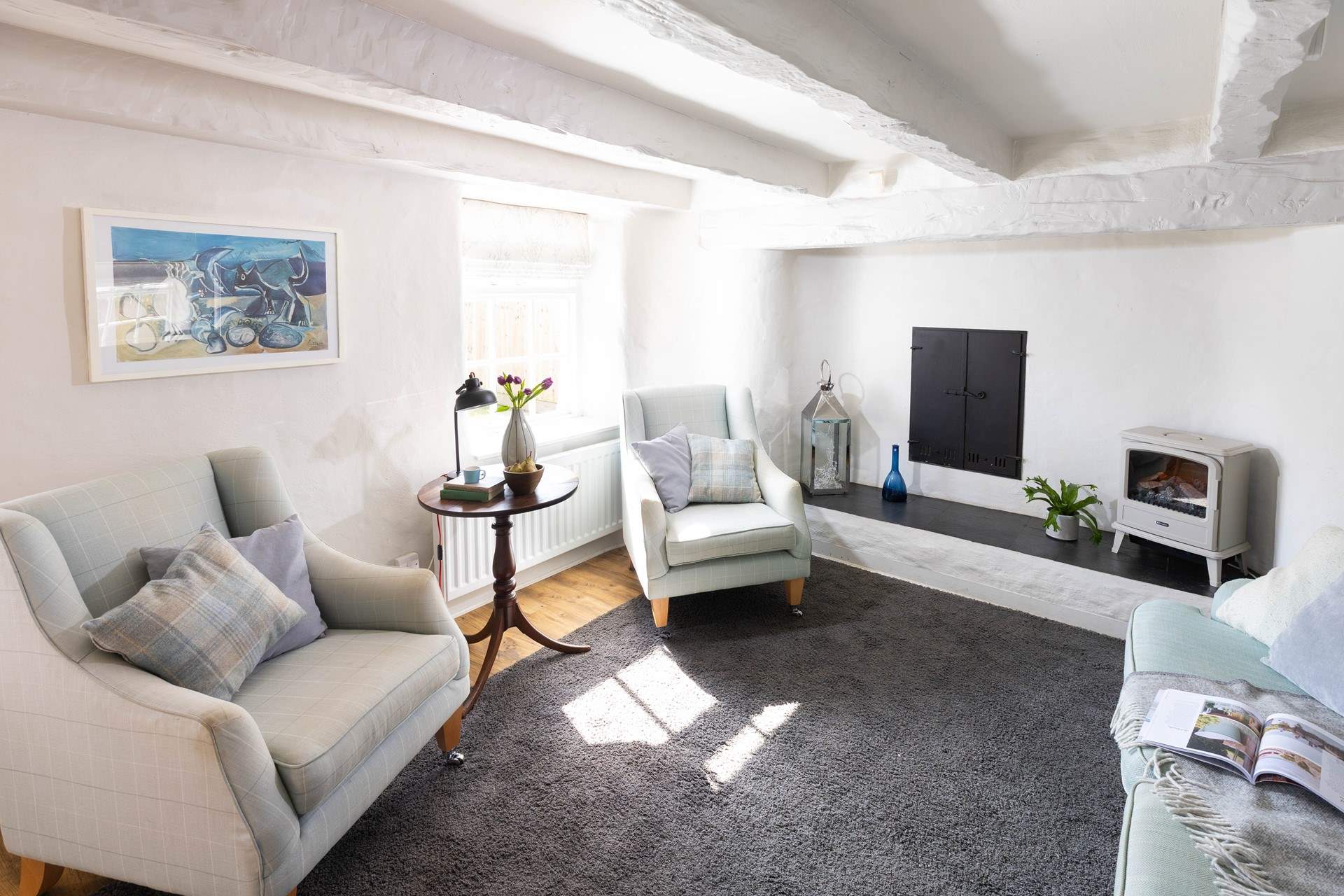 The sitting room overlooks the back garden. 