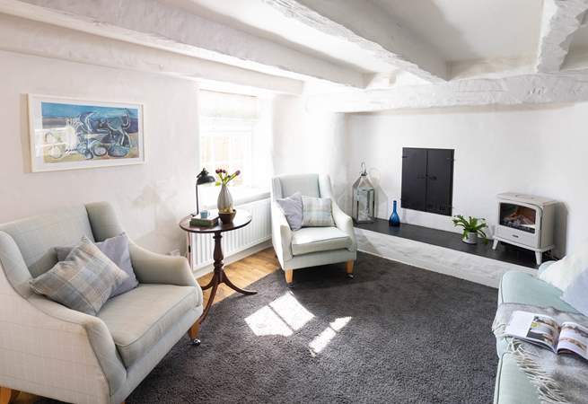 The sitting room overlooks the back garden. 
