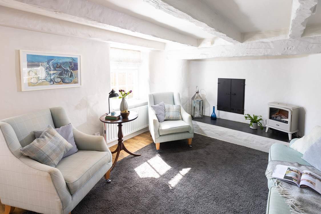 The sitting room overlooks the back garden.