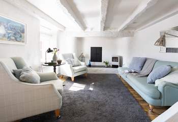 The pretty sitting room is the perfect spot to relax. 