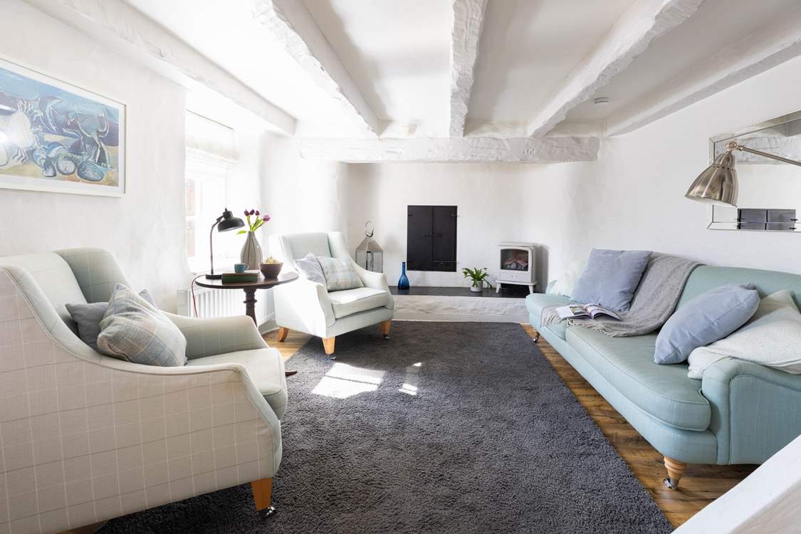 The pretty sitting room is the perfect spot to relax.