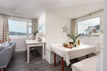 An extra table allows for additional dining space.