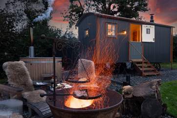Sizzle up some local produce over the flickering fire-pit.