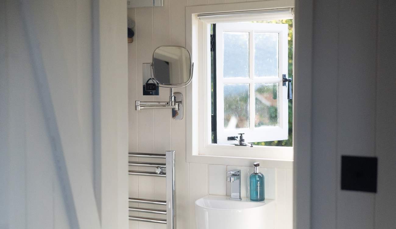 Freshen up for the day ahead in the stylish shower-room.