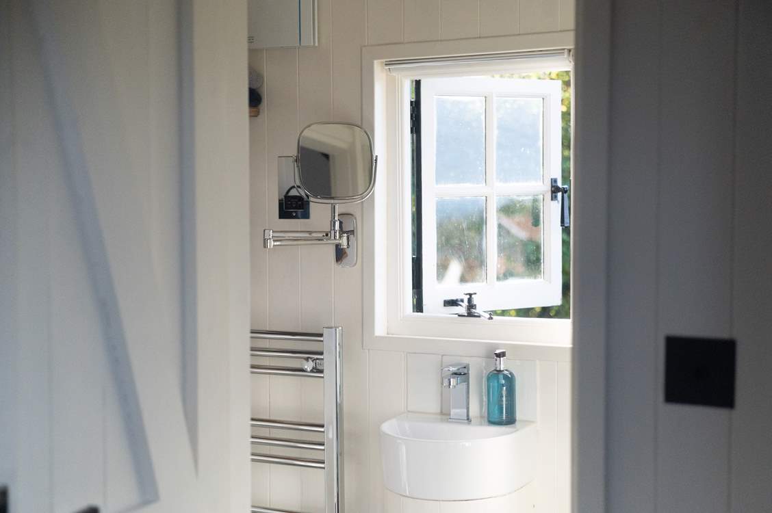 Freshen up for the day ahead in the stylish shower-room.