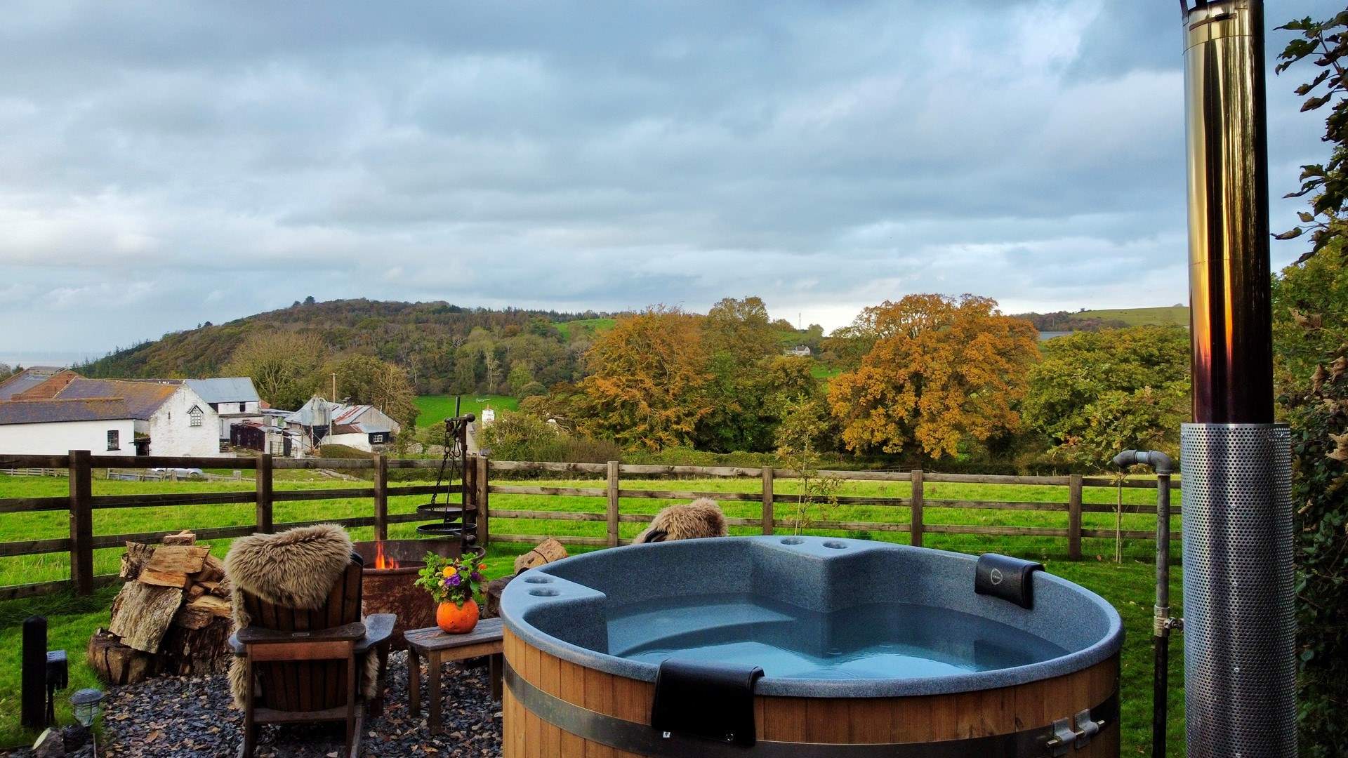 The hot tub boasts views of rolling countryside and out to the Irish sea. 