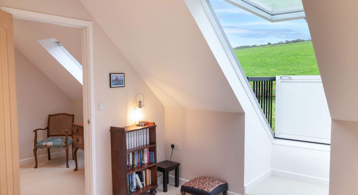 Both bedrooms on the first floor have sweet Velux roof balconies. Take in the view or star gaze on a summer's night. 