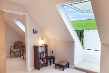 Both bedrooms on the first floor have sweet Velux roof balconies. Take in the view or star gaze on a summer's night.