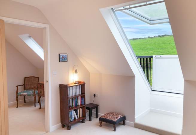 Both bedrooms on the first floor have sweet Velux roof balconies. Take in the view or star gaze on a summer's night. 