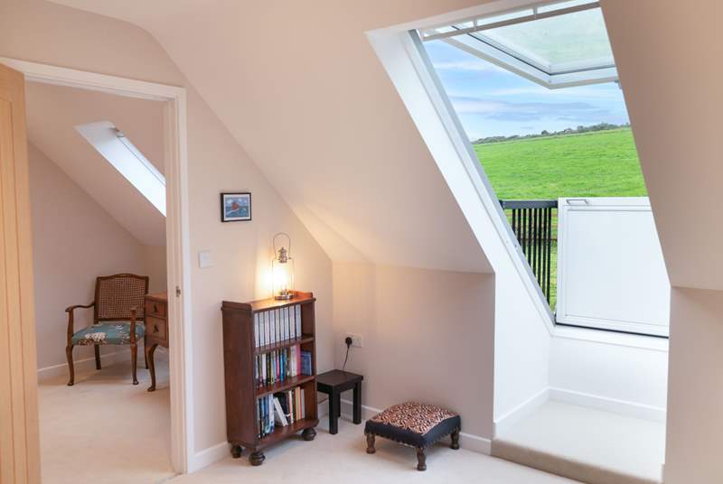 Both bedrooms on the first floor have sweet Velux roof balconies. Take in the view or star gaze on a summer's night. 