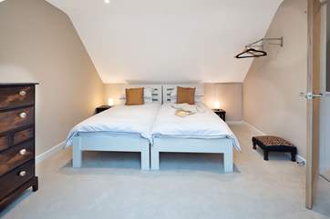 Put your name on the first floor twin with Velux roof window.