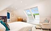 On the first floor, the spacious luxurious en suite with Velux roof balcony is a joy. - Thumbnail Image