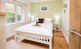 Situated next to the ground floor twin room is one of two double rooms, with king-size bed and garden views.  - Thumbnail Image