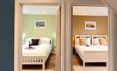 Warm and welcoming, the two ground floor bedrooms. - Thumbnail Image