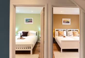 Warm and welcoming, the two ground floor bedrooms.