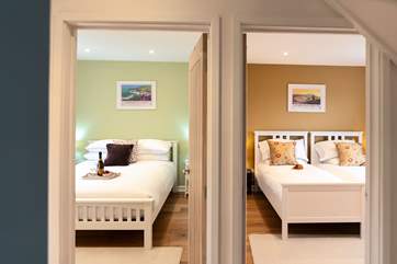 Warm and welcoming, the two ground floor bedrooms.