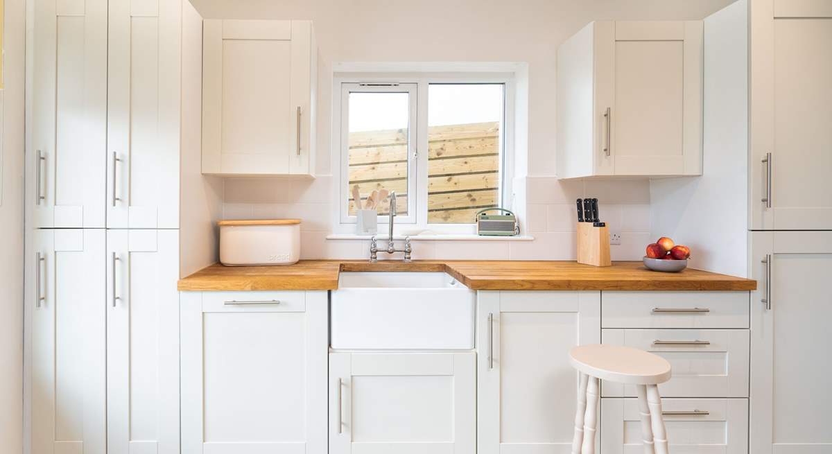 Gather in the airy and light kitchen for a coffee and a chat. 