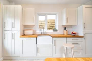 Gather in the airy and light kitchen for a coffee and a chat.