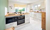 A well-equipped kitchen with a far reaching view over the Pembrokeshire countryside across to the Preseli mountains.  - Thumbnail Image