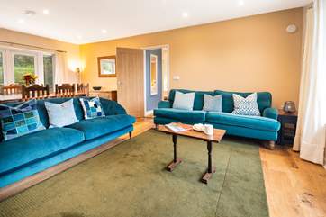 Sink into the sofas in the light and airy sitting-room and take in the views.