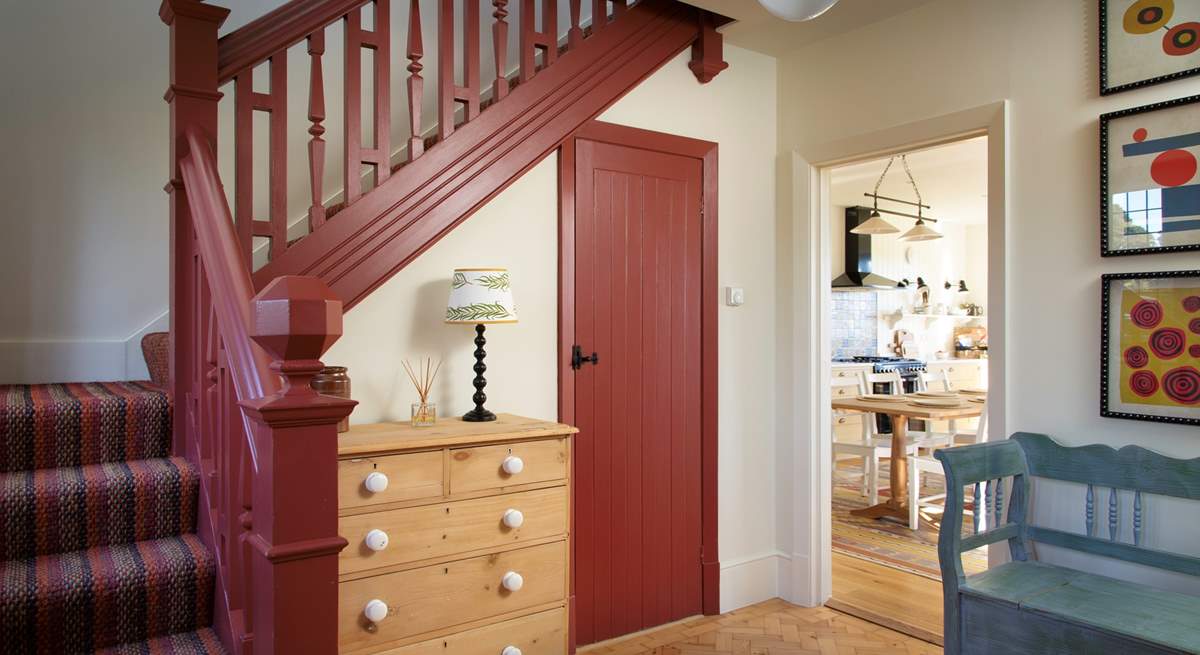 Stairs lead to the bedrooms.