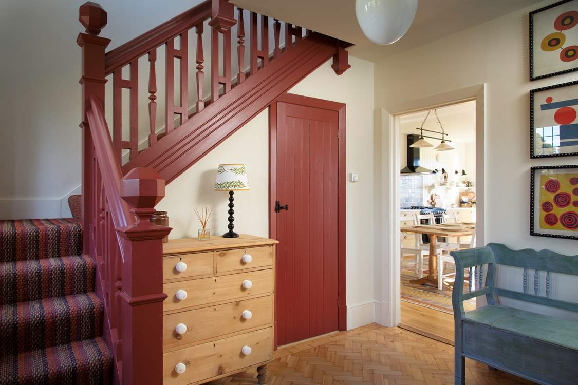 Stairs lead to the bedrooms.