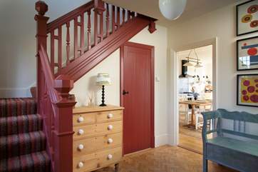 Stairs lead to the bedrooms.