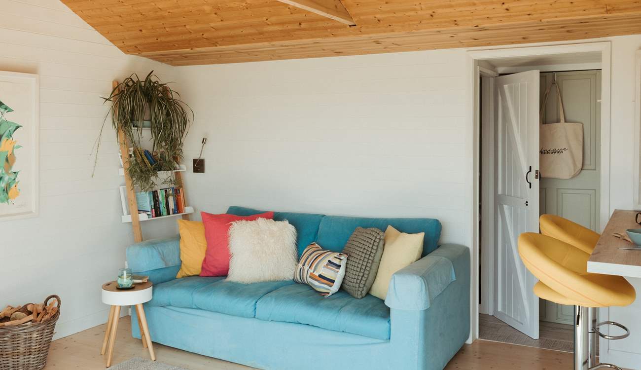 Settle down on the sofa and take in the sea views.