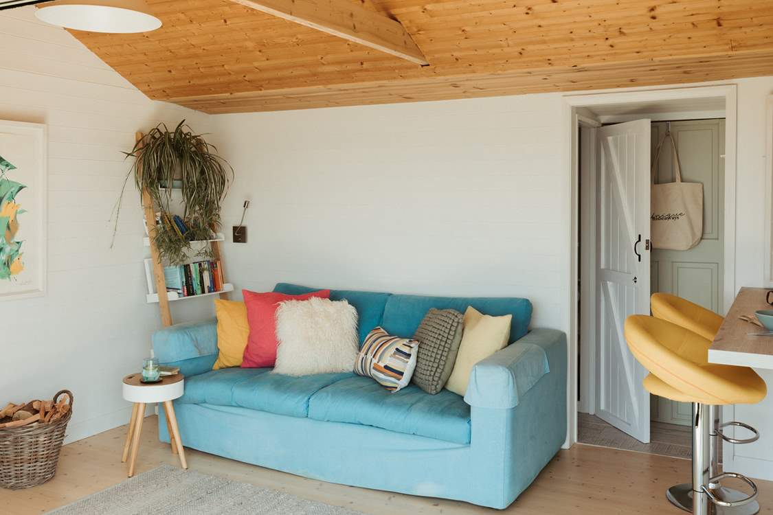 Settle down on the sofa and take in the sea views.