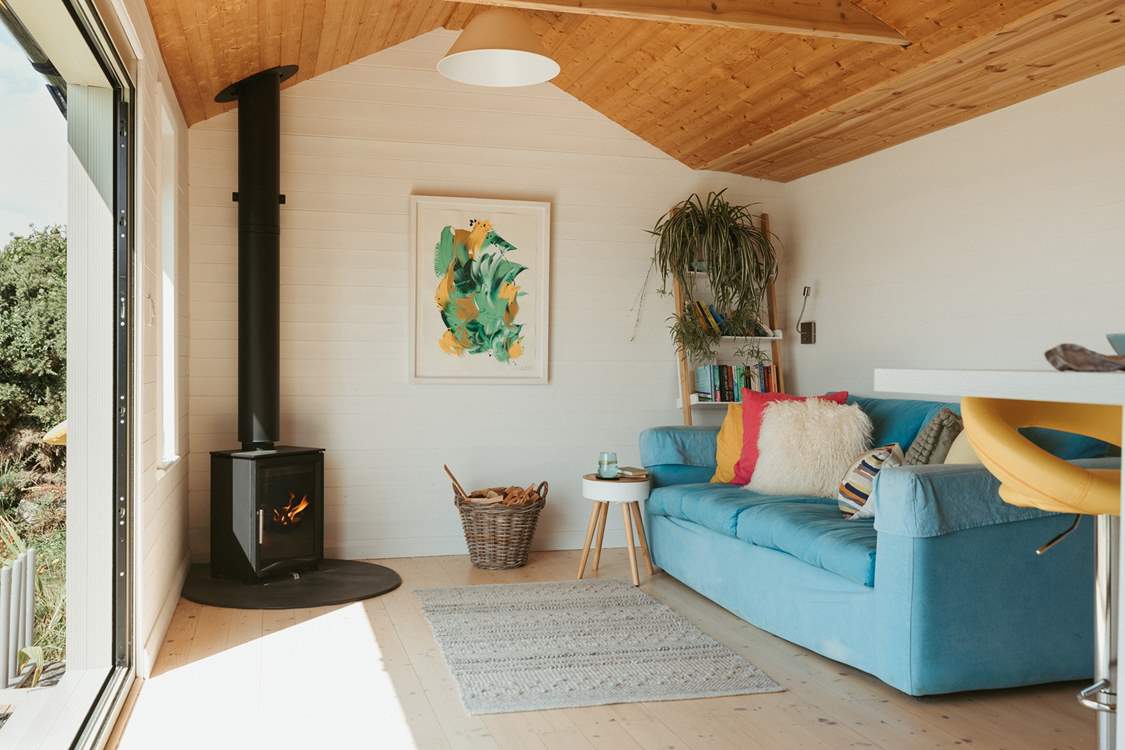 The living area is so inviting with bright bursts of colour to welcome you inside.