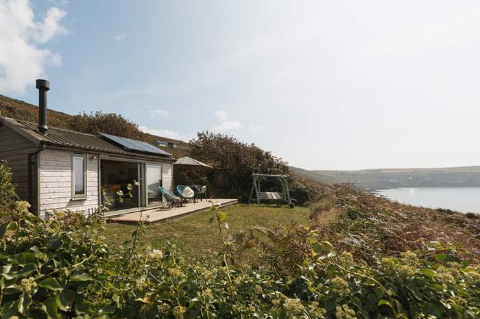 The Eagle is a Bespoke cabin in walking distance to the beach, with sea views in Whitsand Bay.