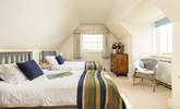 Bedroom 3 has twin beds and cosy linens.  - Thumbnail Image