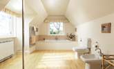 A spacious family bathroom to accommodate all. - Thumbnail Image