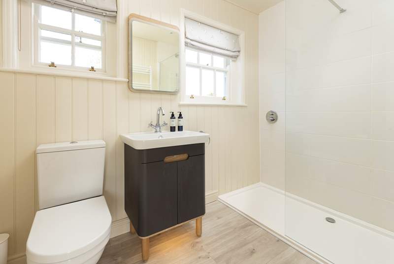 The modern en suite shower-room to bedroom 2. 