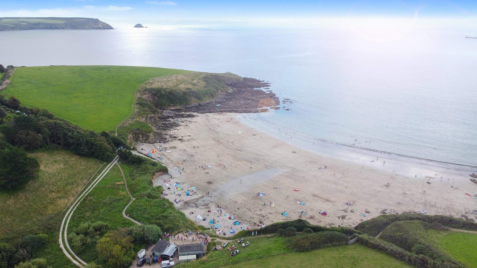 Porthcurnick beach is at the bottom of the lane.
